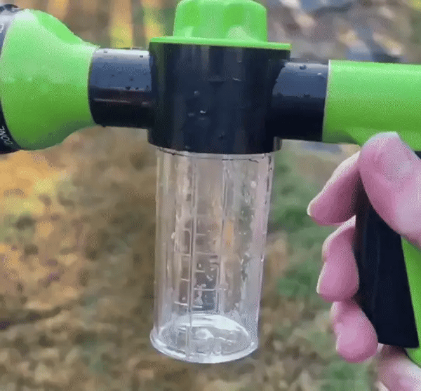 dog shower with adjustable jet, hose, and sprayer.